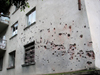 Abkhazia - Sukhumi: bullet holes (photo by A.Kilroy)