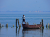 Pogradec, Kor County, Albania: Ohrid Lake - a boy and his boat - photo by J.Kaman