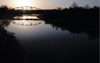 Canada / Kanada - Saskatchewan - Moose Jaw: brilliant sunset over a truss bridge - photo by M.Duffy