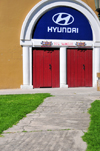 Quito, Ecuador: Quito Bullring - Plaza de Toros de Quito - separate doors for seats in the sun and in the shade - Hyundai sponsorship - photo by M.Torres