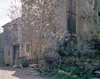 Fox Amphoux, Var, PACA, France: antiques shop - sign on an old wheel under a blooming tree - Les Monts de Vaucluse - photo by A.Bartel