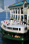 Hong Kong: Central Ferry Piers - Silver Star ferry, Kowloon in the background - photo by M.Torres