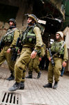 Hebron, West Bank, Palestine: young Israeli soldiers patrol the streets - Tzahal -  Israel Defense Forces - IDF - photo by J.Pemberton