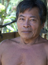 Panama - Chagres National Park: Embera Drua man stares at the camera - photo by H.Olarte