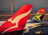 Johannesburg, Gauteng, South Africa: aircraft tails - Qantas and South African Airways - Qantas Boeing 747-438 VH-OJO 'The Spirit of Australia' (cn 25544/894) - OR Tambo International / Johannesburg International Airport / Jan Smuts / JNB - Kempton Park, Ekurhuleni - photo by M.Torres