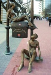 Slovakia / Slowakei - Bratislava: Metal ladies on a postbox - photo by J.Kaman