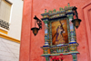 Ayamonte, Huelva, Andalucia, Spain: Jesus in a small shrine made of ceramic and tiles - photo by M.Torres