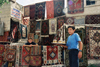 Turkey - Derinkuyu: erving tea in front of carpets - quintessential Turkish scene - photo by J.Kaman