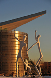 Denver, Colorado, USA: Colorado Convention Center admired by the figures of the sculpture 'Dancers' by Jonathan Borofsky - Speer Boulevard - photo by M.Torres