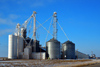 Etter, Moore County, Texas, USA: grain processing facility on the BNSF railway line - grain bins by the U.S. Highway 287, Texas Panhandle - photo by M.Torres